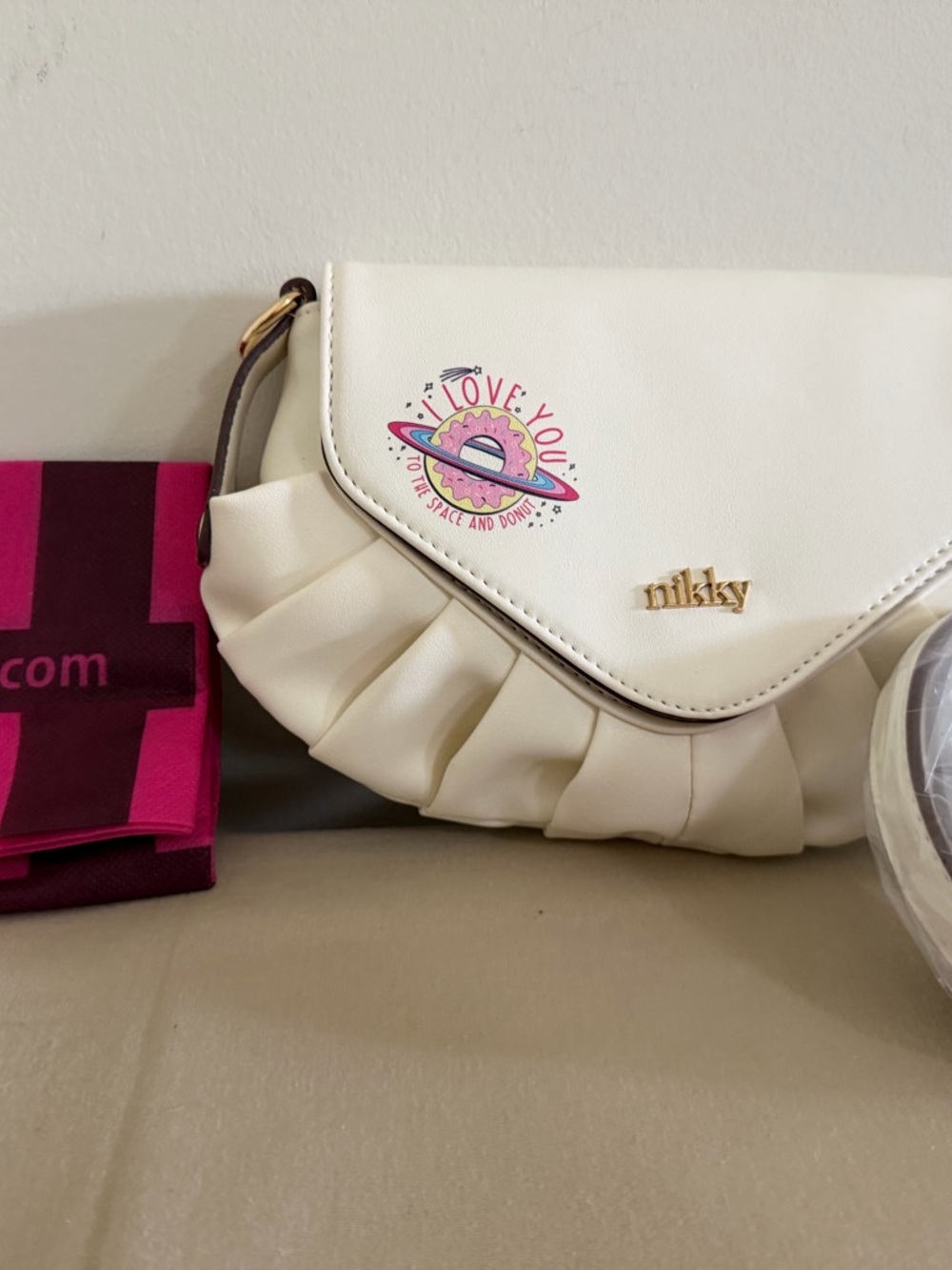 Nikky White Ruffle Crossbody Bag with Pink Accent